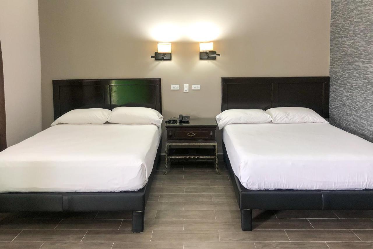 Capital O Palms Hotel, Acuna Ciudad Acuña エクステリア 写真