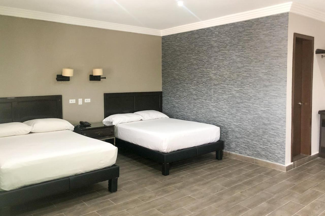 Capital O Palms Hotel, Acuna Ciudad Acuña エクステリア 写真